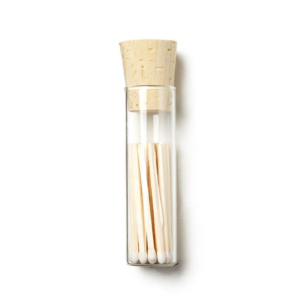 Vial of white tipped matches